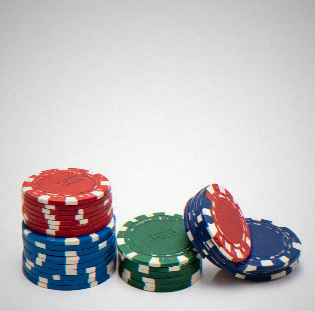 Close-up of 10-gram clay composite poker chips stacked and fanned