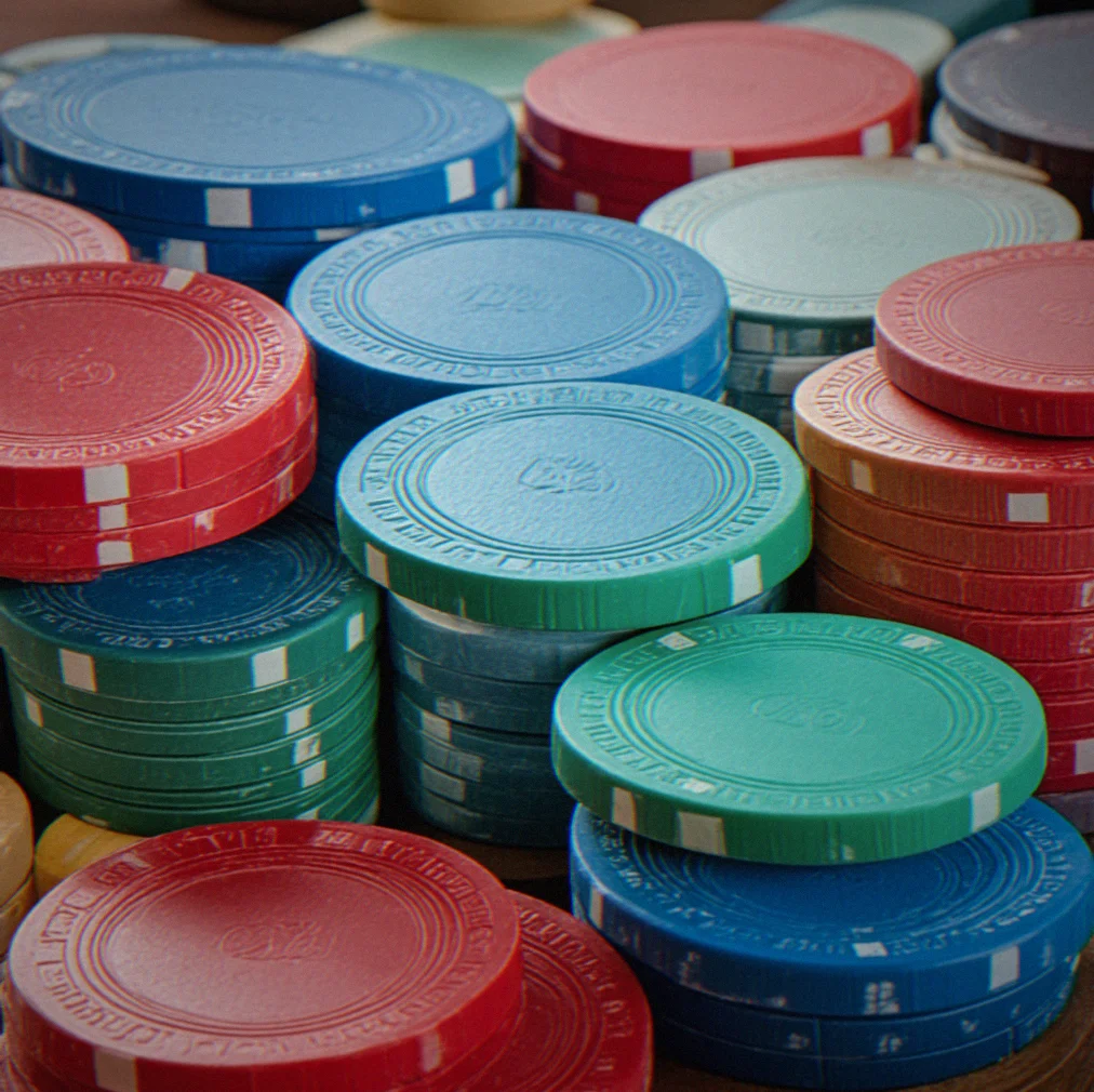 The dealer works at the table, the cards come out of the deck with a button and blinds in the right places during the deal